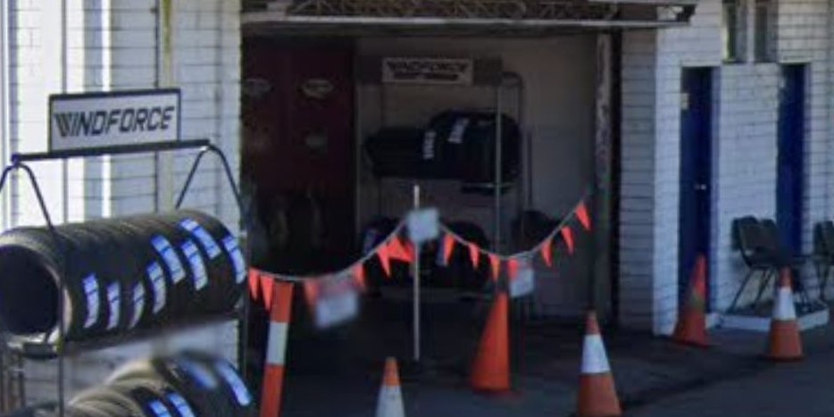The tyre rack outside an open workshop bay at Alex Ross Automotive